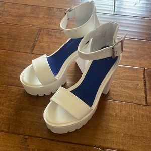 White platform heels